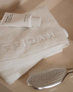 Cloud | The Barrier Towel folded on the vanity