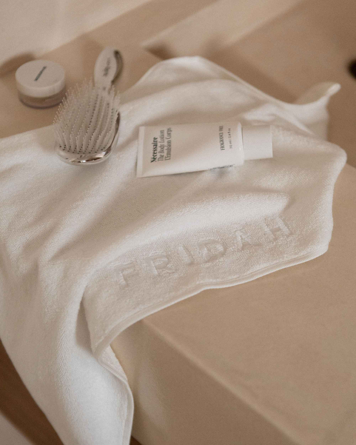 The Barrier Towel draped on the vanity