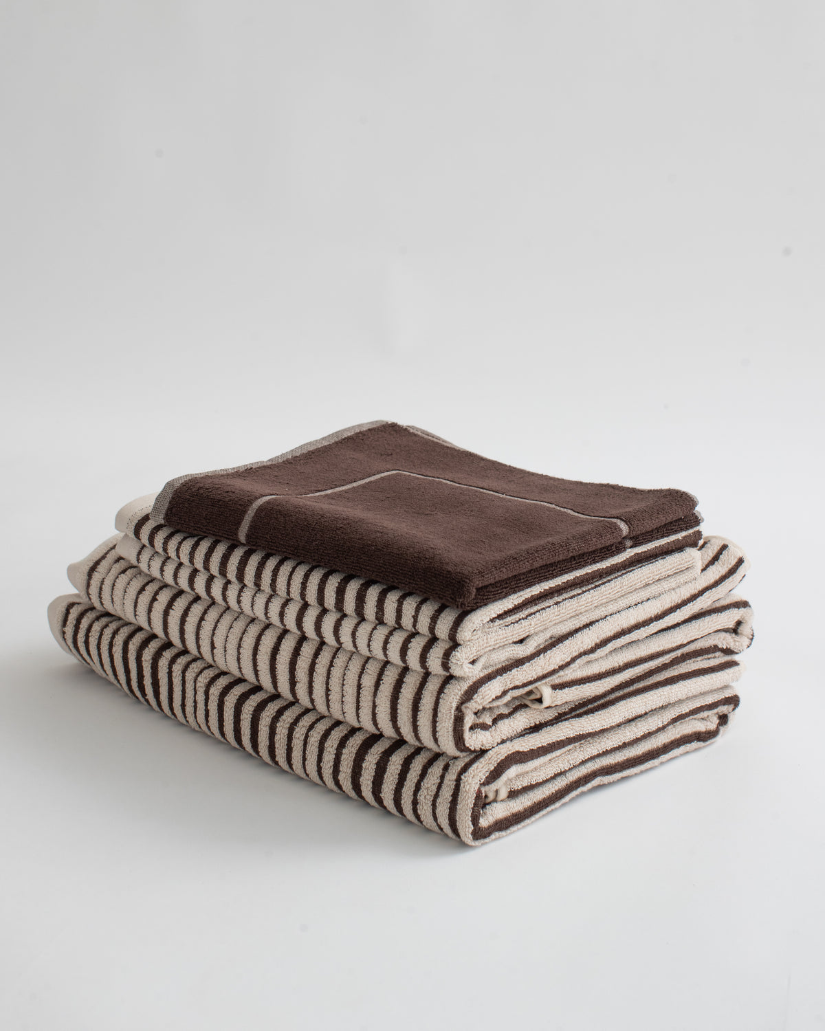 Towels in each colourway stacked side by side