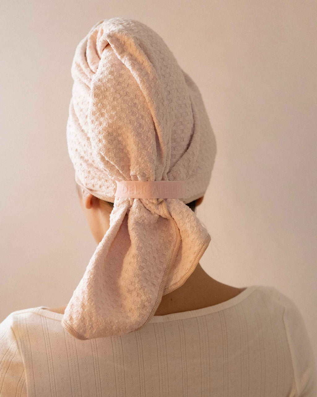 The back of The Repair Wrap, knotted with the tail hanging