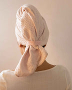 Blush | The back of The Repair Wrap, knotted with the tail hanging