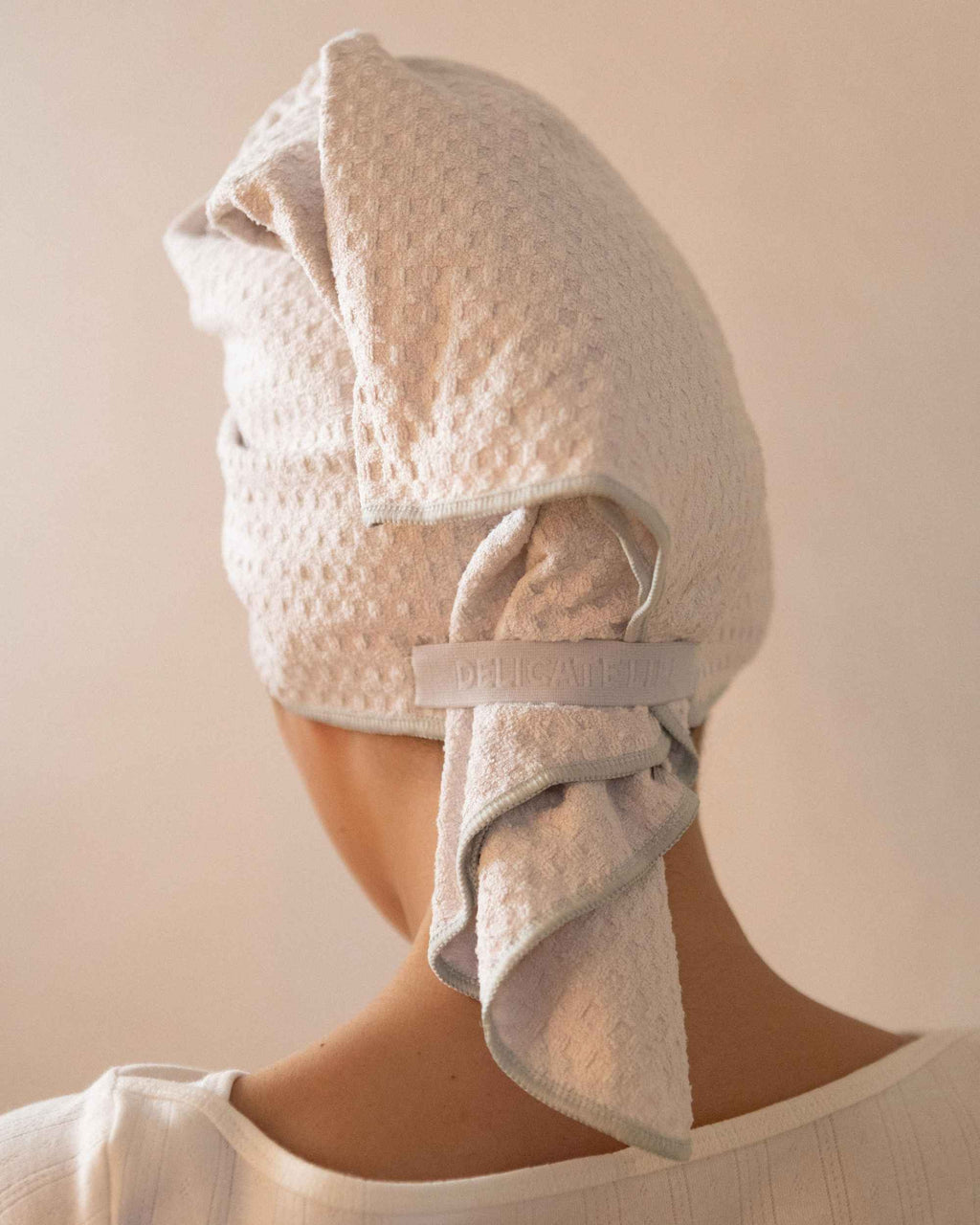 The back of The Repair Wrap, tied with the tail hanging