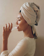 Mist | Drinking a glass of water with The Repair Wrap on