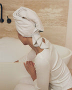 Mist | Sitting on the edge of the bath with The Repair Wrap on