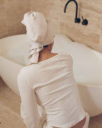 Mist | The Repair Wrap seen from behind at the bath