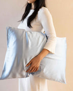 Mist | Carrying The Restore Case pillow under one arm