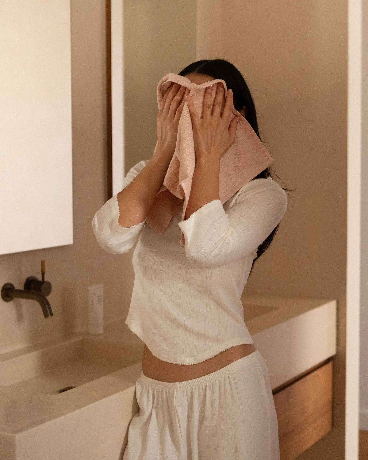 The Barrier Towel pressed to face