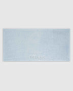 Mist | The Barrier Towel laid flat showing the embossed logo