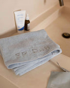 Mist | The Barrier Towel folded on the vanity
