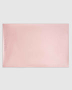 Blush | The Restore Case laid flat showing the embossed logo